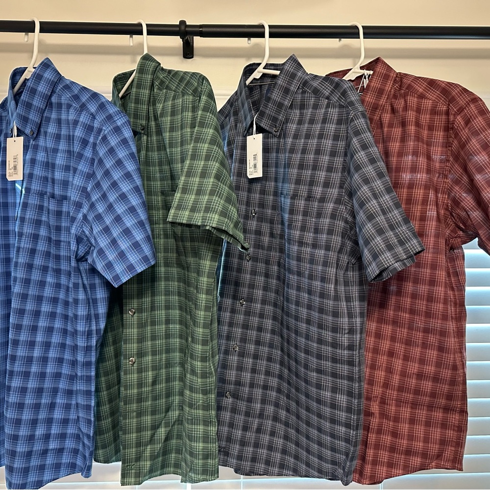 New w/tags Men’s button down shirts  all 4 are plaid new never worn.